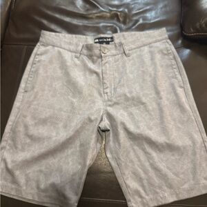 Travis Mathew shorts with pineapples.